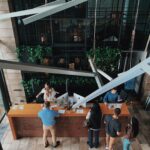 High angle view of guests at a hotel reception desk