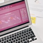 Laptop showing financial graphs